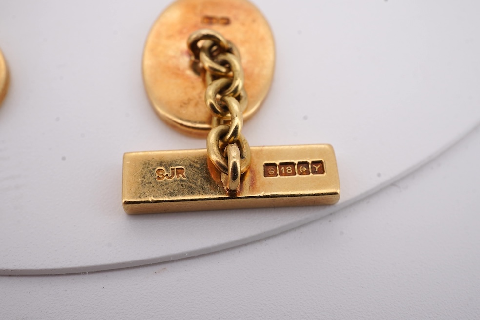 A pair of Elizabeth II 18ct gold oval cufflinks, engraved with lion's head crest, S.J. Rose & Son, Birmingham, 1973, 22 grams. Condition - fair